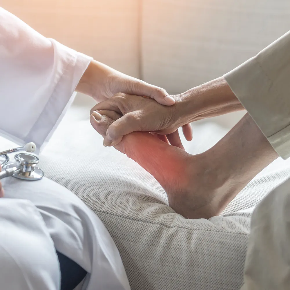 Doctor examining plantar fasciitis foot pain