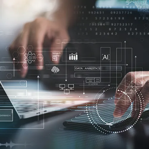 Person using laptop with digital code and numbers overlay.