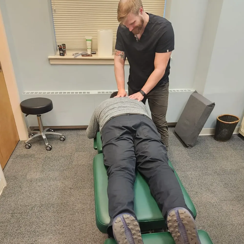 Photo of patient receiving chiropractic massage