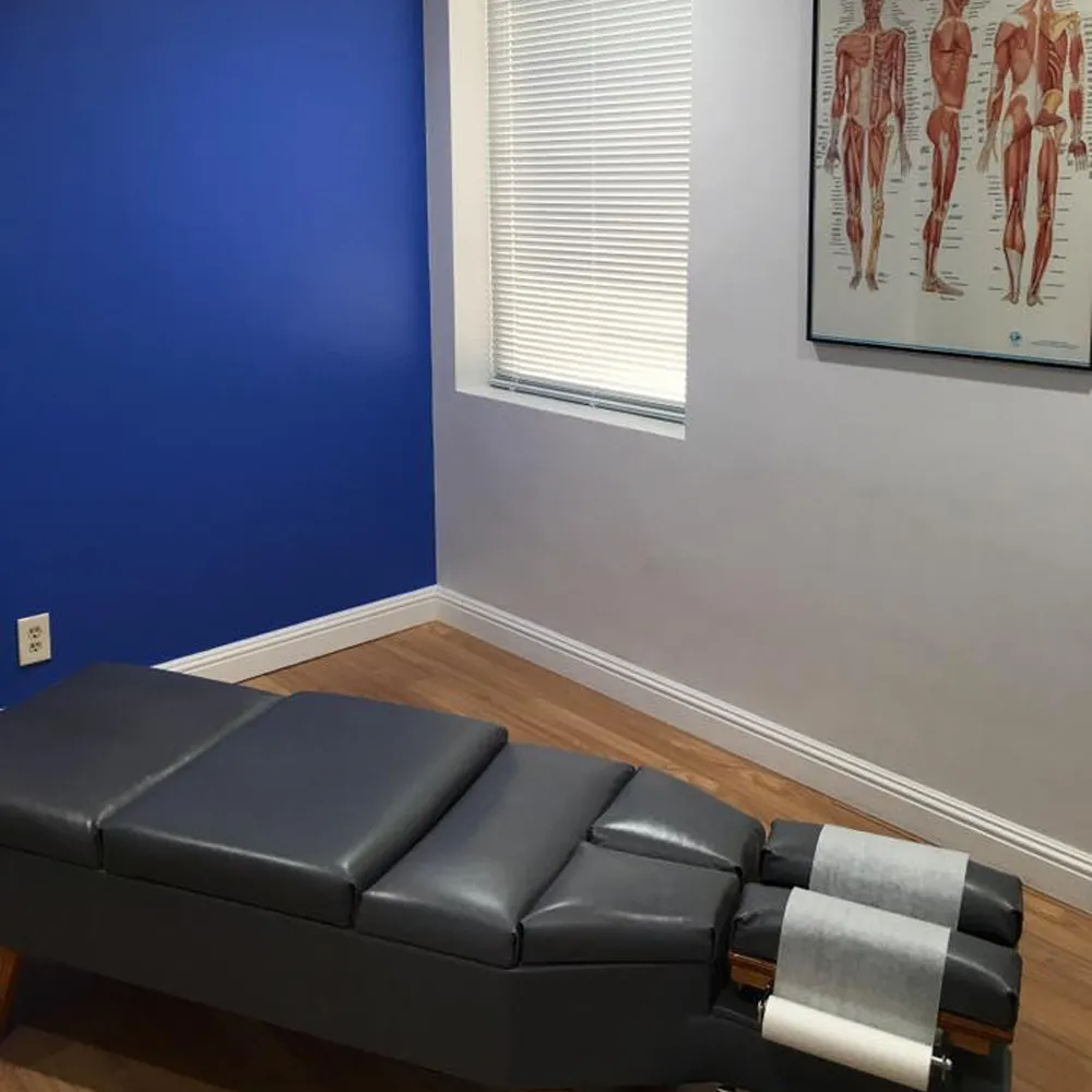 Chiropractic room with blue accent wall