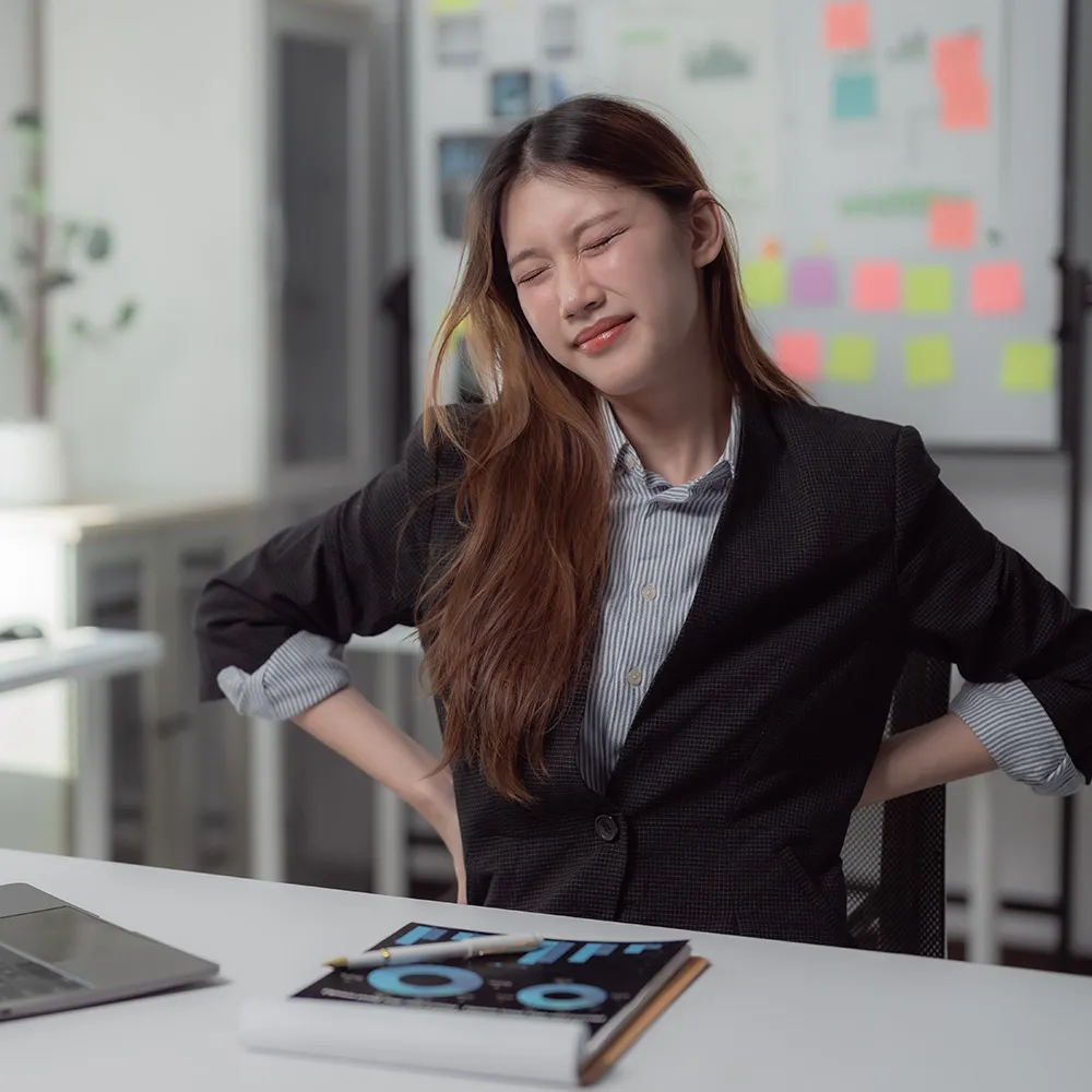 Posture-related back pain in businesswoman