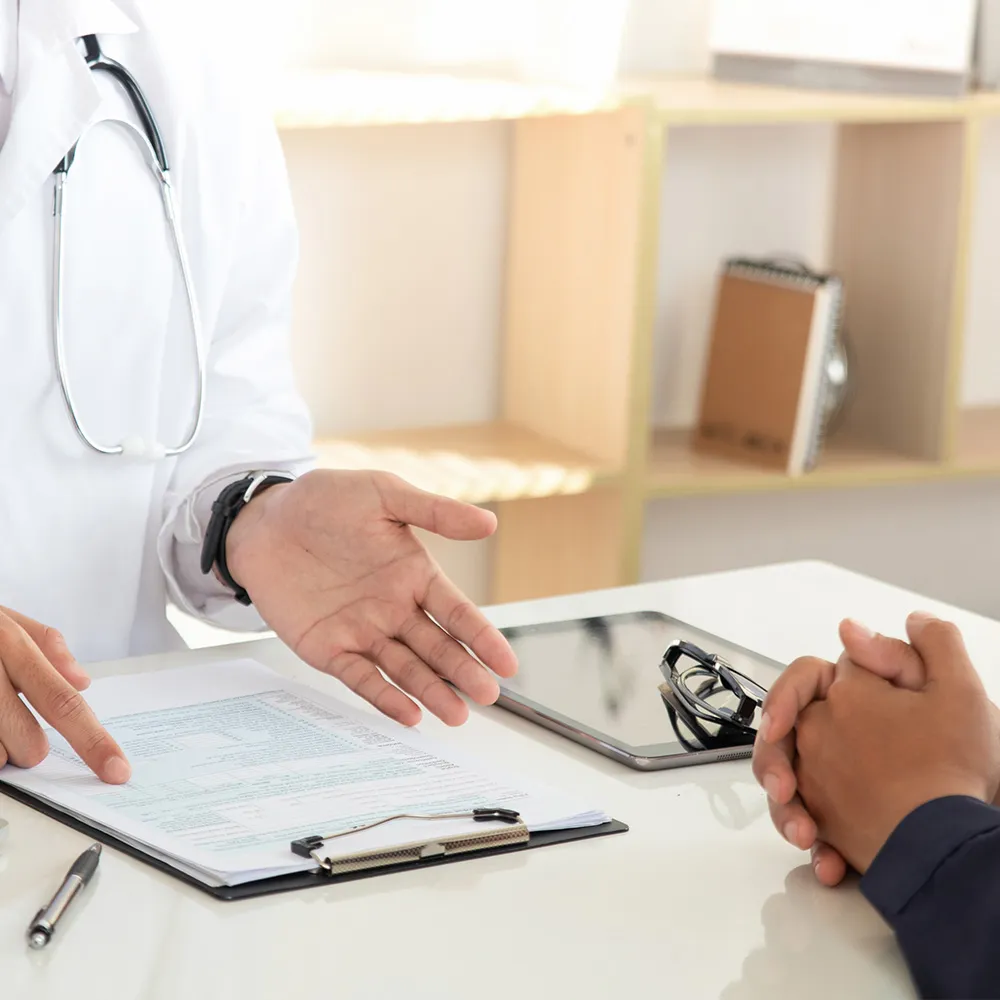 Doctor explaining diagnosis to patient  