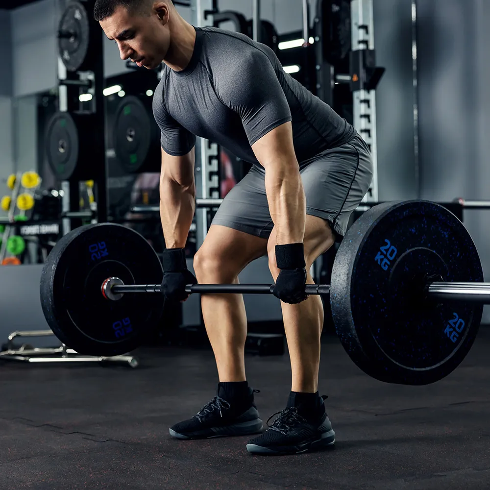 Group of men training in gym workout