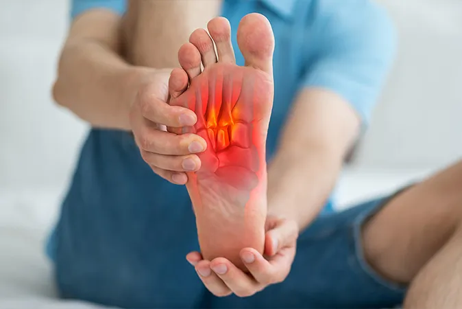 Woman eating a fresh fruit plate