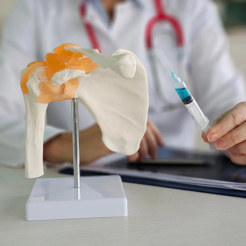 Prolotherapy injection syringe being held  