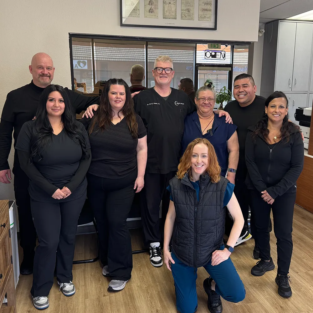 Group photo of chiropractic clinic team