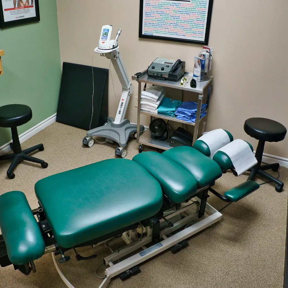 Chiropractic adjustment room with therapy equipment
