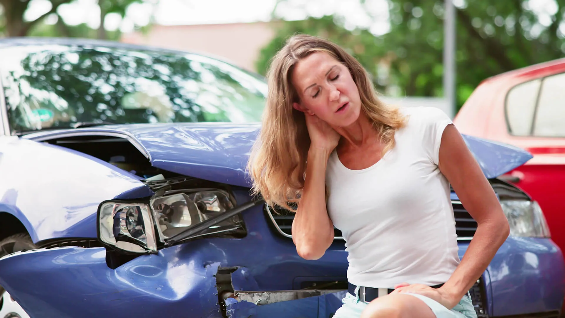 Woman with whiplash from a car accident.