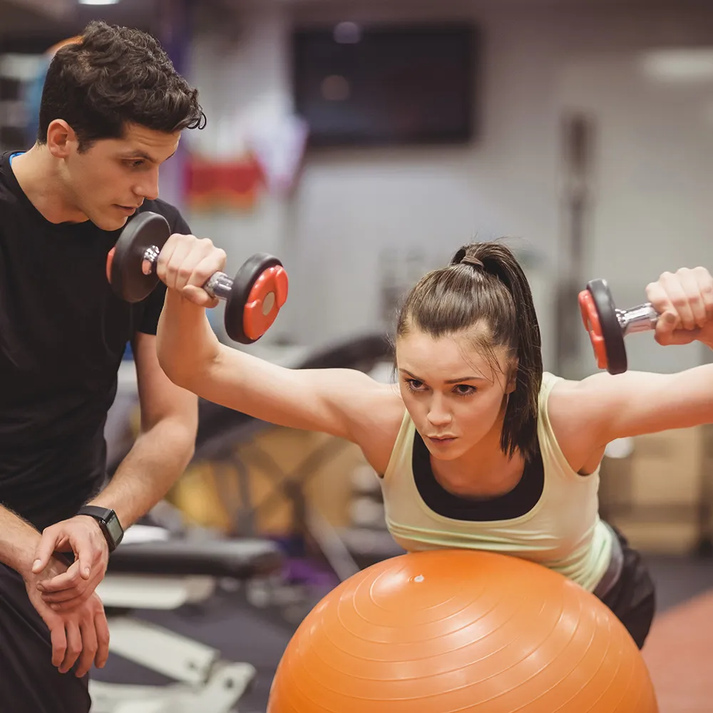 Woman training with Physical Therapist