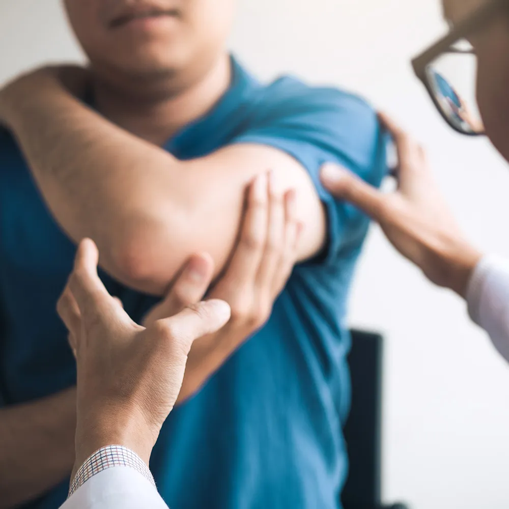 Doctor flexing patient