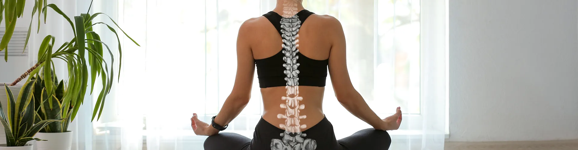 Woman seated in gyan mudra pose with spine model overlay.