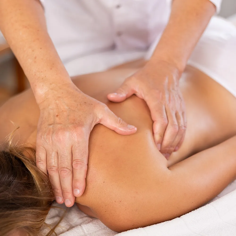 Person receiving a relaxing Swedish massage.