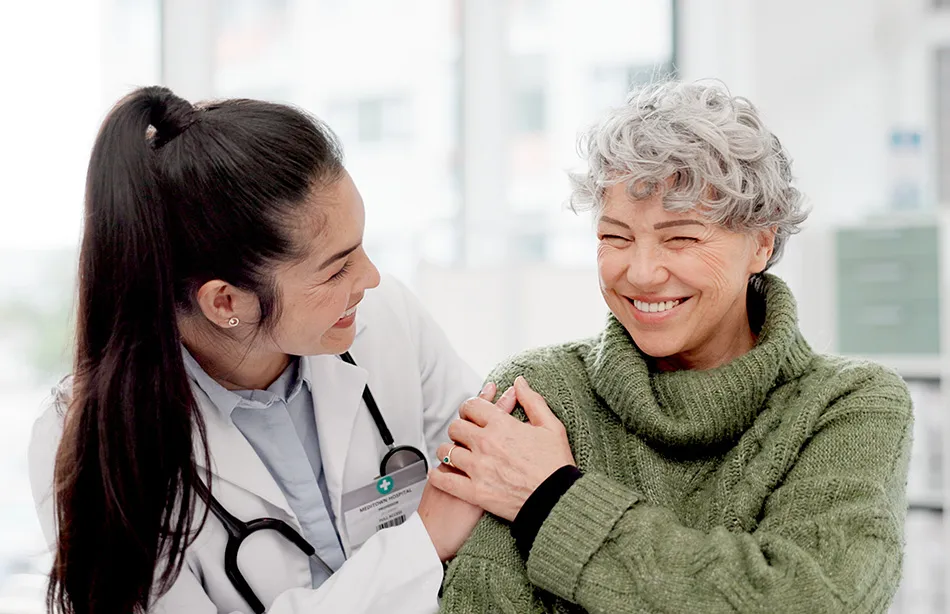 Doctor and patient smiling