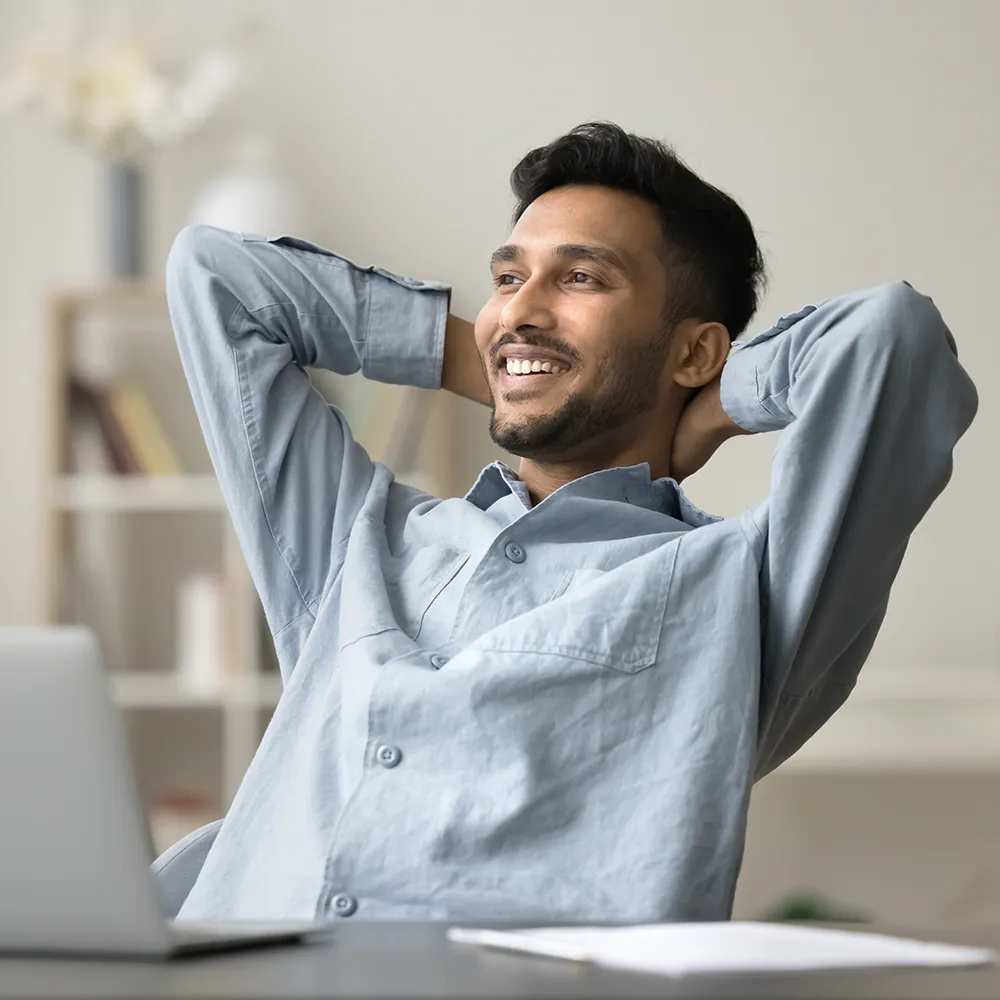 Man smiling with relaxed good posture
